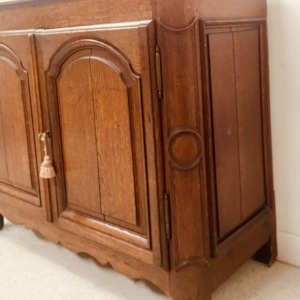 Sideboard with two molded chapel-style doors, solid oak top, 18th century