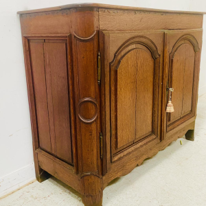 Sideboard with two molded chapel-style doors, solid oak top, 18th century