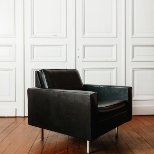 Armchair in black imitation leather, 1960
