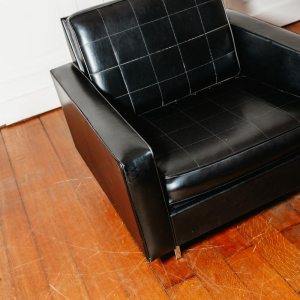 Armchair in black imitation leather, 1960