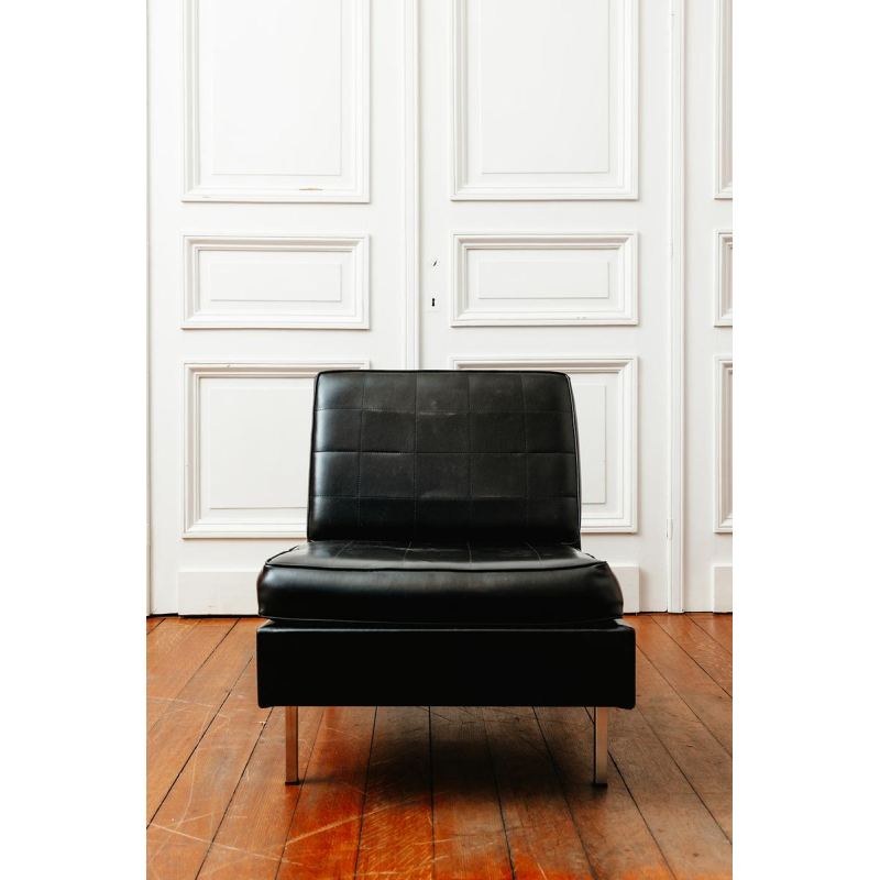 Black vinyl armchair, circa 1960