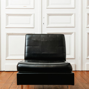 Black vinyl armchair, circa 1960