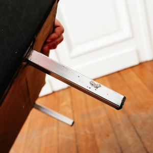 Black vinyl armchair, circa 1960