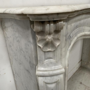 Three-shell Louis XV style fireplace in white marble, 19th century