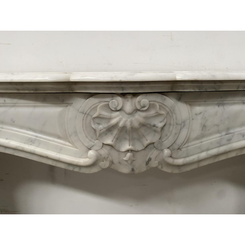 Three-shell Louis XV style fireplace in white marble, 19th century