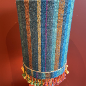 "Stoneware Bottle" lamp with a blue and multicoloured lampshade, handwoven in India