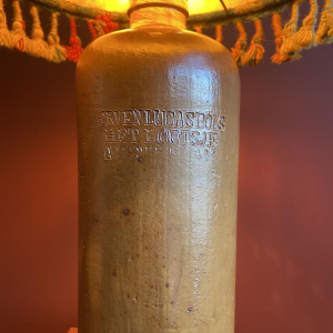 "Stoneware Bottle" lamp with a blue and multicoloured lampshade, handwoven in India