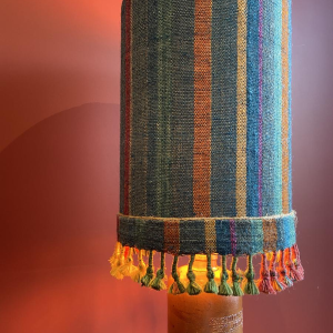 "Stoneware Bottle" lamp with a blue and multicoloured lampshade, handwoven in India