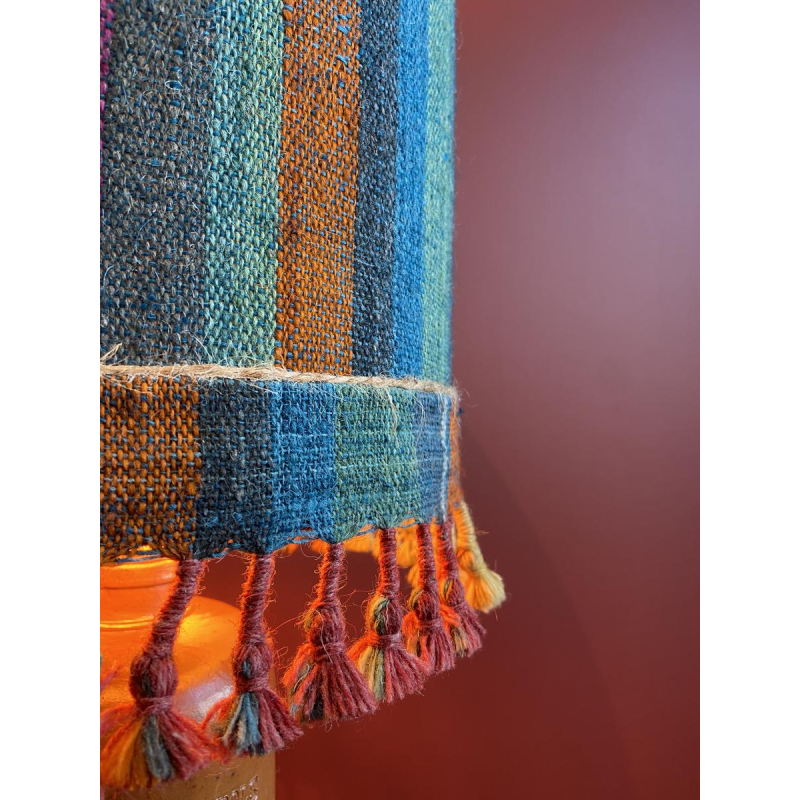 "Stoneware Bottle" lamp with a blue and multicoloured lampshade, handwoven in India