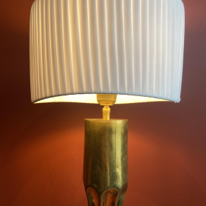 Handcrafted lamp with pleated, wavy cylindrical shade and brass shell socket