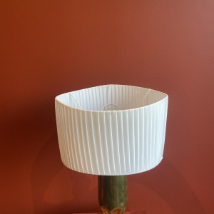 Handcrafted lamp with pleated, wavy cylindrical shade and brass shell socket
