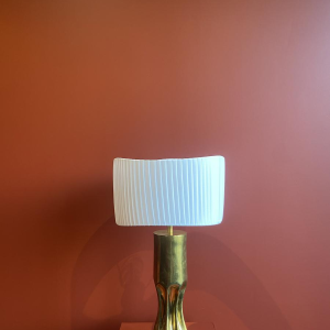 Handcrafted lamp with pleated, wavy cylindrical shade and brass shell socket