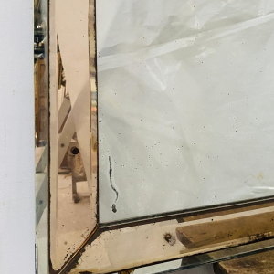 Mirror with tinted glass frame, glass finial decoration, ca. 1950