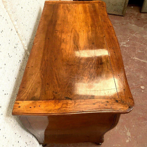 Louis XV style bombé commode in solid walnut, 18th century