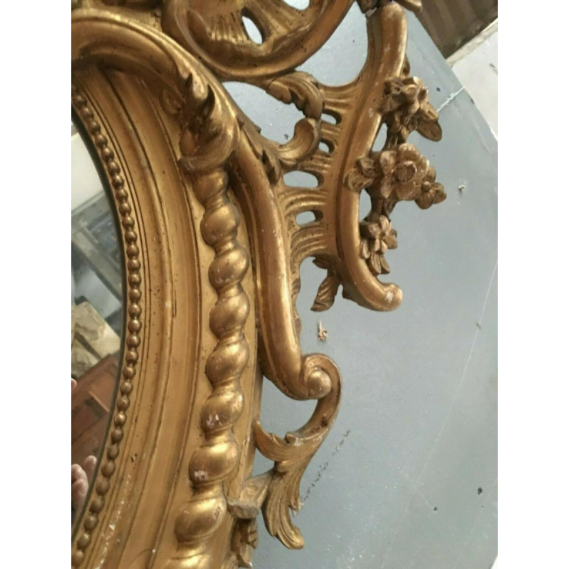 Miroir Louis VX ovale à fronton, bois et stuc doré, glace biseautée, Napoléon III