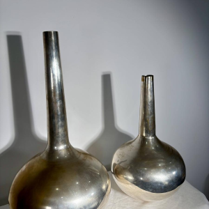 Pair of large stamped "bottle" vases - silver-plated metal - Italy, 20th century