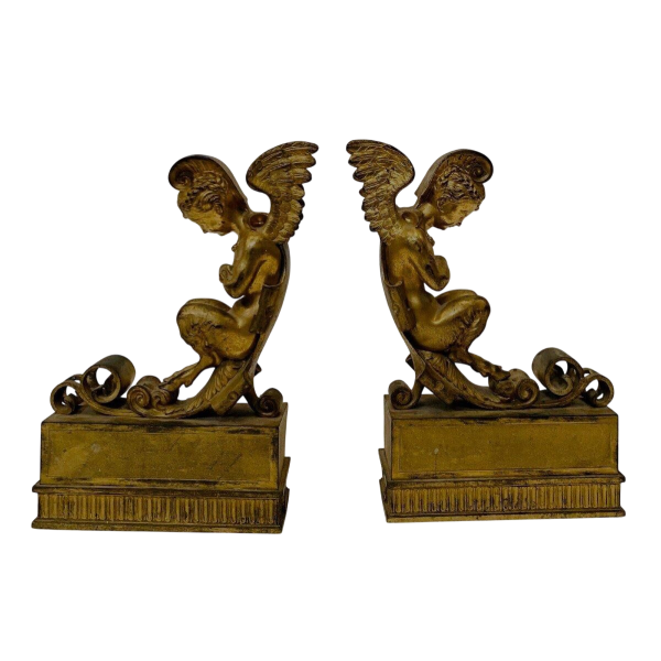 Pair of gilt bronze andirons decorated with winged fauns, 19th century