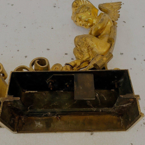 Pair of gilt bronze andirons decorated with winged fauns, 19th century