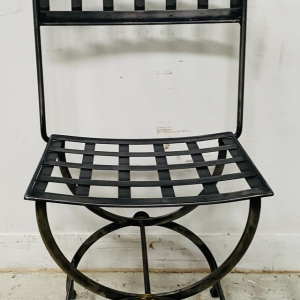 Set of four cast iron chairs with brass balls, 20th century