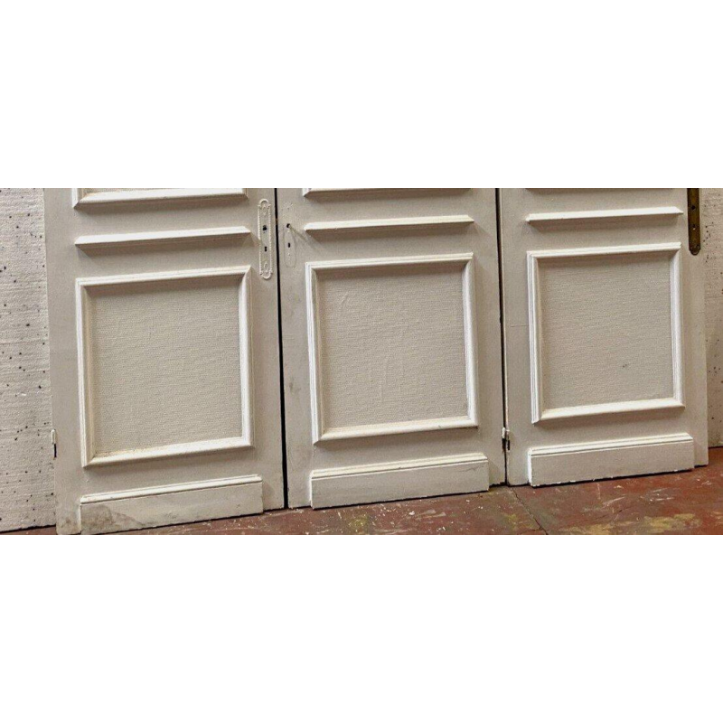 Suite de trois portes de passage moulurées à double faces, XIXᵉ siècle