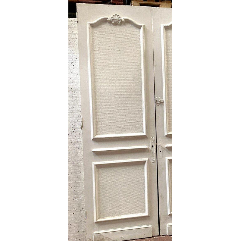 Suite de trois portes de passage moulurées à double faces, XIXᵉ siècle