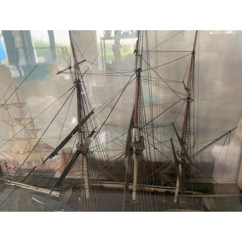 Antique model of a three-masted sailing ship in its display case, 19th century