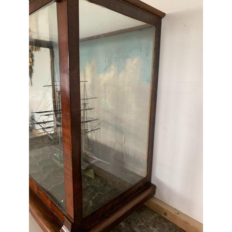 Antique model of a three-masted sailing ship in its display case, 19th century