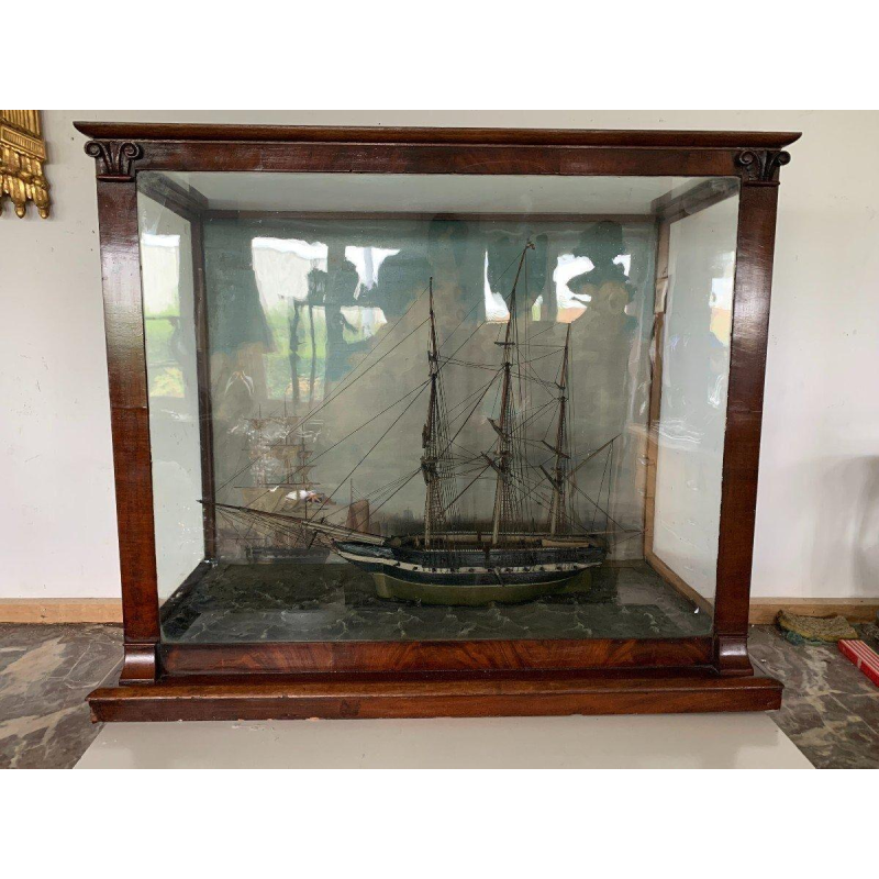 Antique model of a three-masted sailing ship in its display case, 19th century