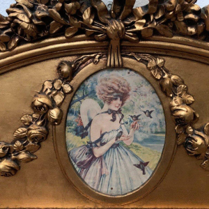 Miroir trumeau de style Louis XVI en bois et stuc doré, XXᵉ siècle