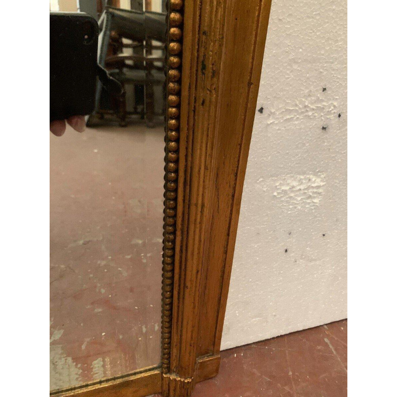 Louis XVI style trumeau mirror in wood and gilded stucco, 20th century