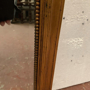 Louis XVI style trumeau mirror in wood and gilded stucco, 20th century