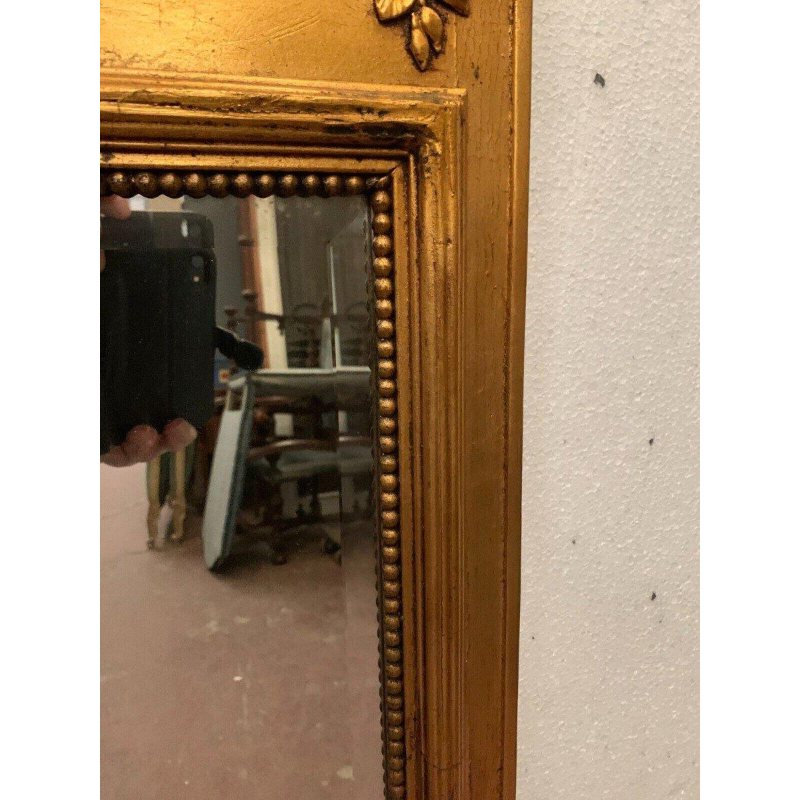 Miroir trumeau de style Louis XVI en bois et stuc doré, XXᵉ siècle
