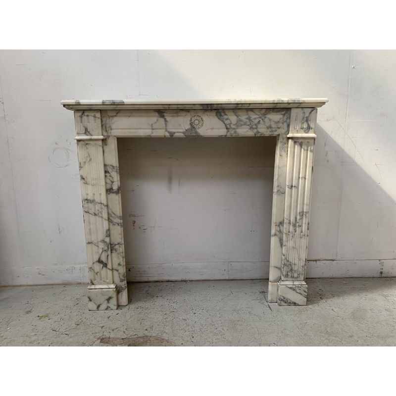 Louis XVI style fireplace, finely carved white marble, late 19th century