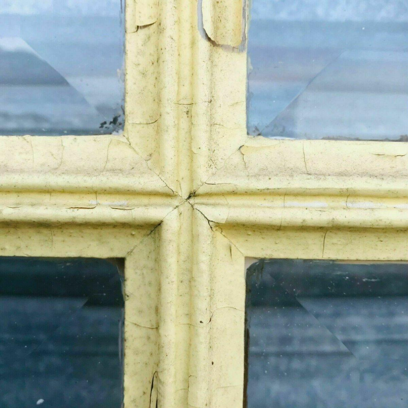 Set of 4 glazed doors, divided into four panels with beveled panes, early 20th century