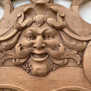 Porte manteau / parapluie / miroir en chêne sculpté, XXᵉ siècle