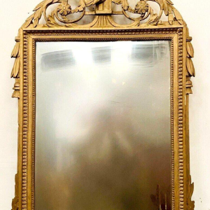 Louis XVI style mirror in wood and gilded stucco, 19th century