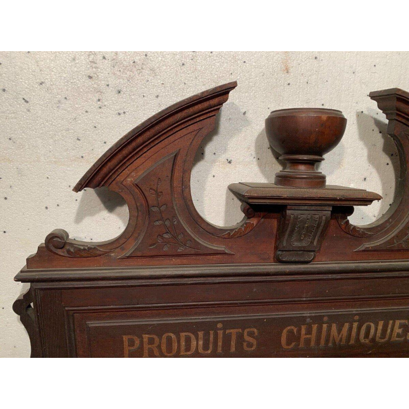 Napoleon III style pediment/top of a cabinet inscribed "Chemical Products," natural wood, 19th century