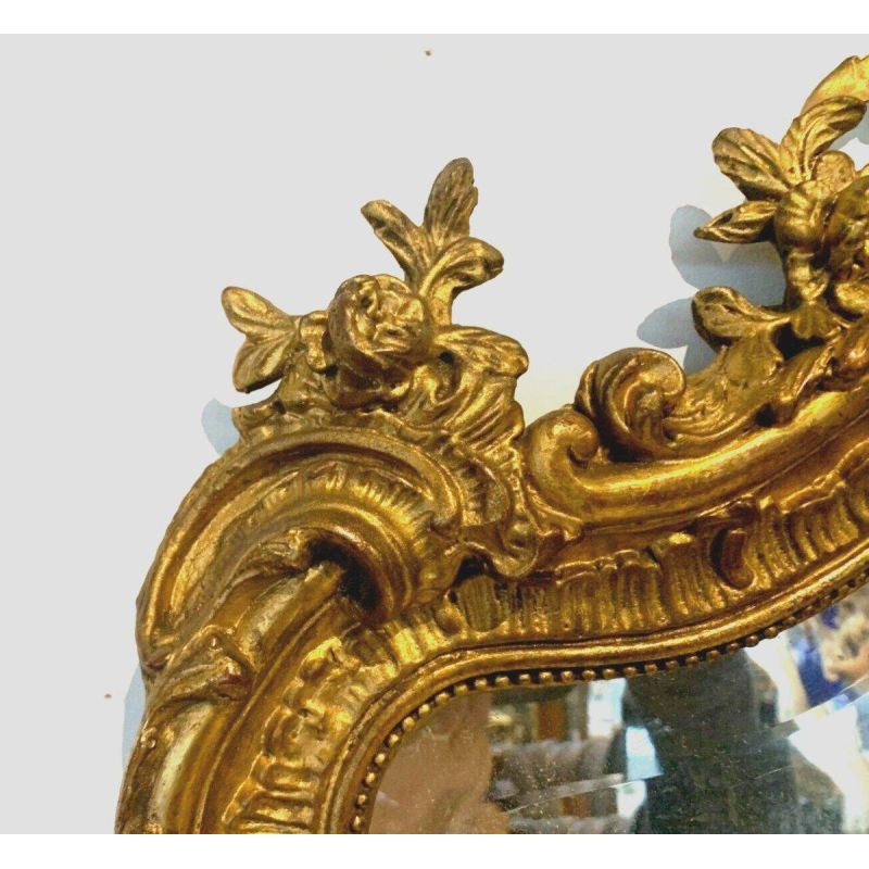 Louis XV Rococo style mirror in wood and gilded stucco, early 20th century