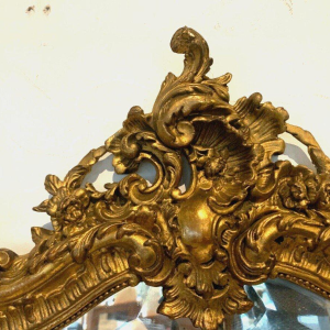Louis XV Rococo style mirror in wood and gilded stucco, early 20th century