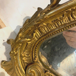 Louis XV Rococo style mirror in wood and gilded stucco, early 20th century