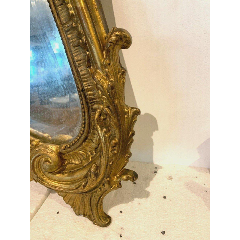 Louis XV Rococo style mirror in wood and gilded stucco, early 20th century