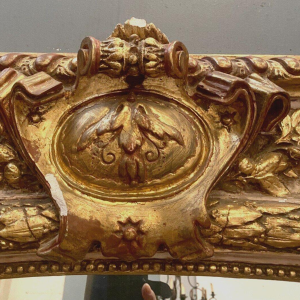 Miroir de style Louis XV en bois et stuc doré et patiné, XIXᵉ siècle