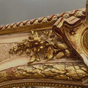 Louis XV style mirror in wood and gilded and patinated stucco, 19th century