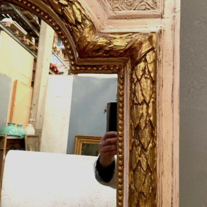 Louis XV style mirror in wood and gilded and patinated stucco, 19th century