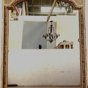 Louis XV style mirror in wood and gilded and patinated stucco, 19th century