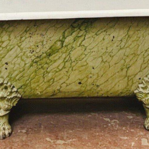 Enameled cast iron bathtub, faux marble patina, claw feet, 19th century
