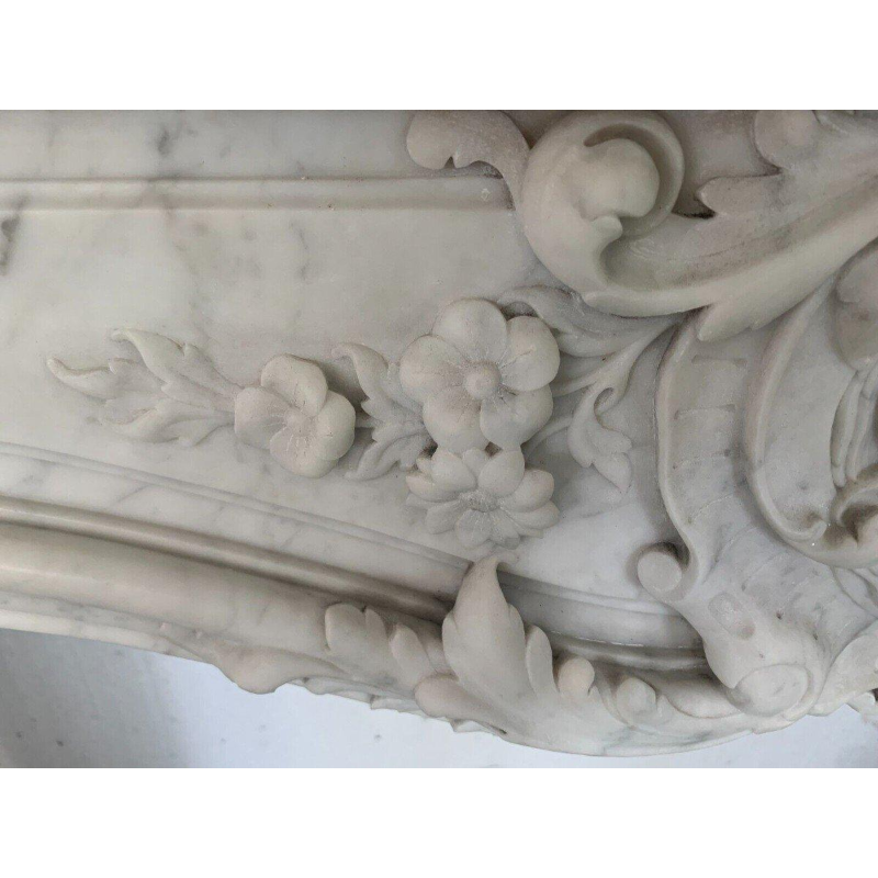 Louis XV style fireplace in white Carrara marble, 19th century