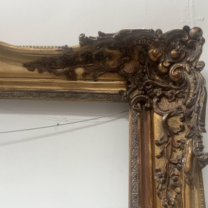 Large frame in wood and gilded stucco (H 195cm) 19th century