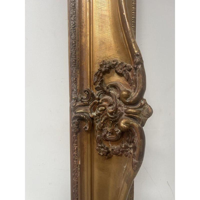 Large frame in wood and gilded stucco (H 195cm) 19th century