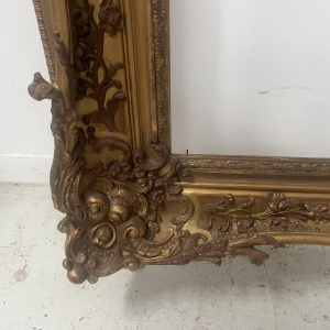Large frame in wood and gilded stucco (H 195cm) 19th century